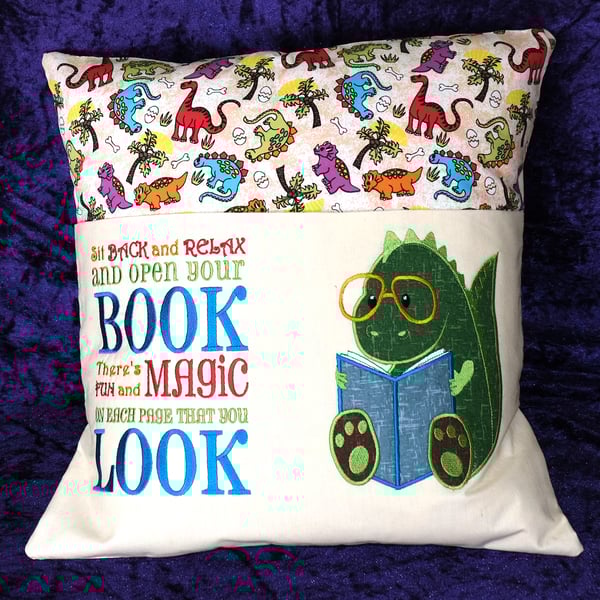 Embroidered dinosaur reading cushion 