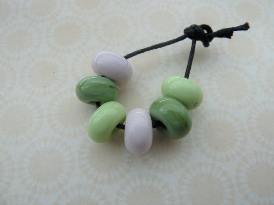 handmade lampwork green and pink spacer beads
