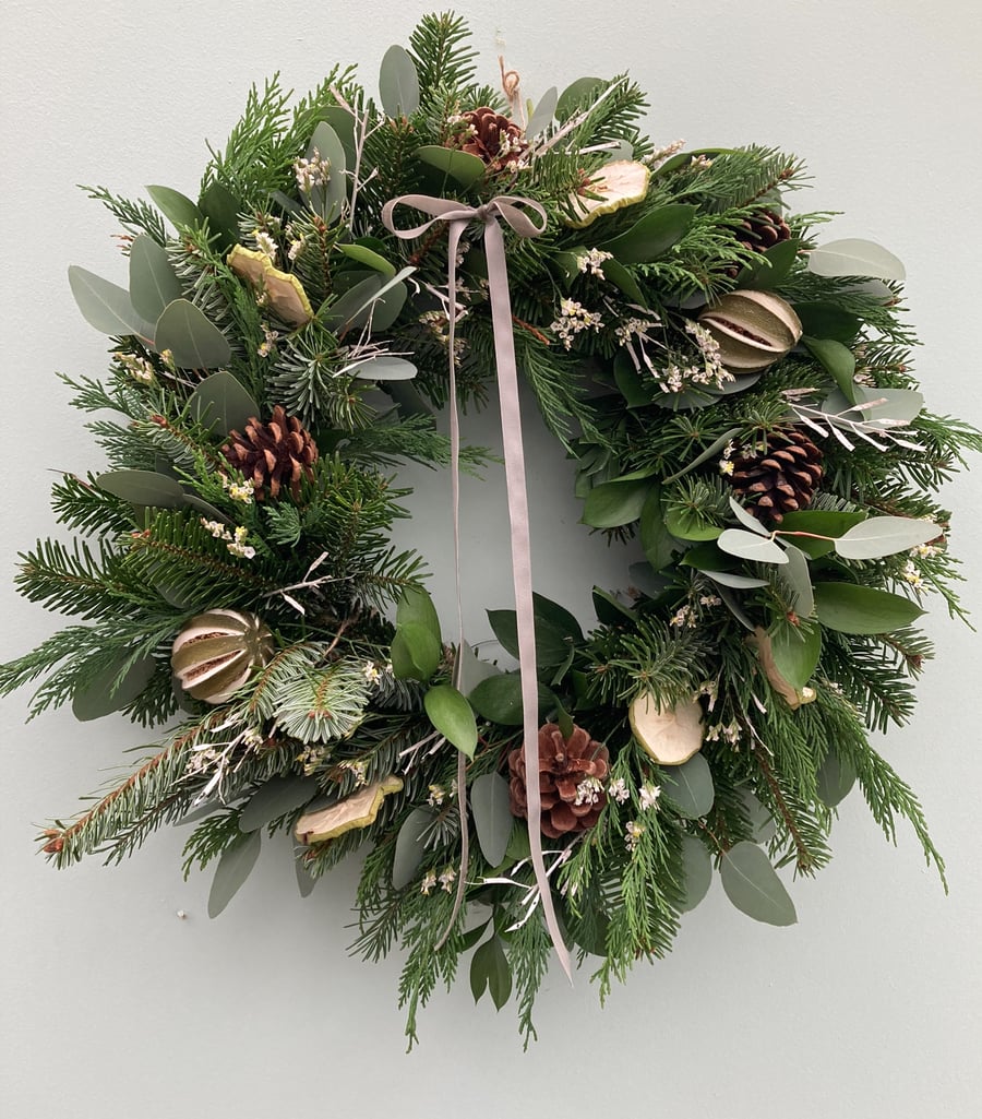 Traditional fresh frosty style Christmas wreath 