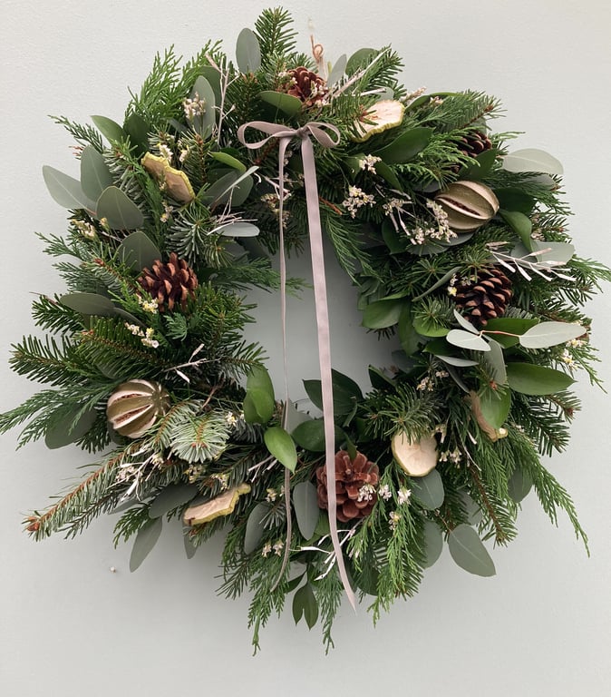 Traditional fresh frosty style Christmas wreath 