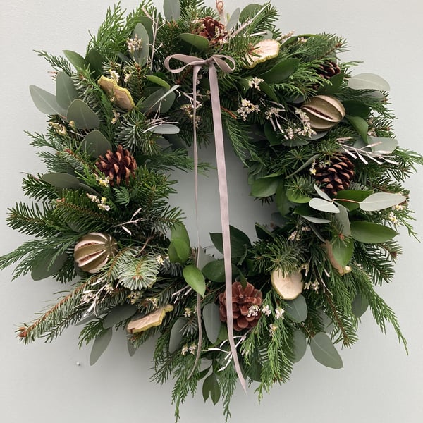 Traditional fresh frosty style Christmas wreath 
