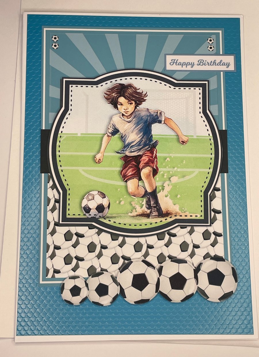 Young boy playing football Happy Birthday card