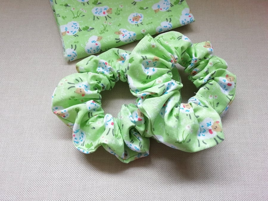 Set of 2 handmade pale green scrunchies with a fun sheep pattern