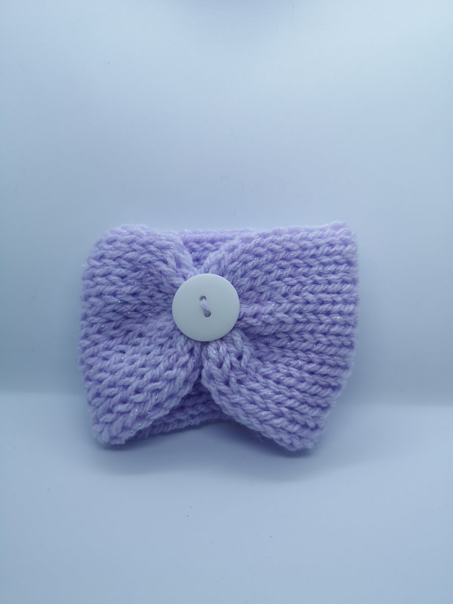 Handknitted lilac glittery cup cosie