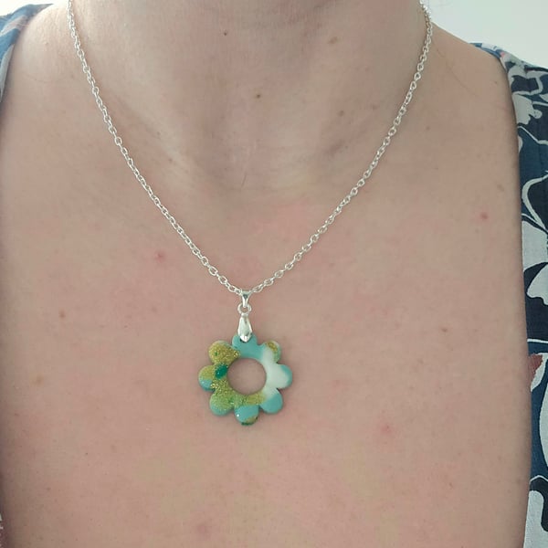 Polymer green and gold flower necklace on a silver plated chain