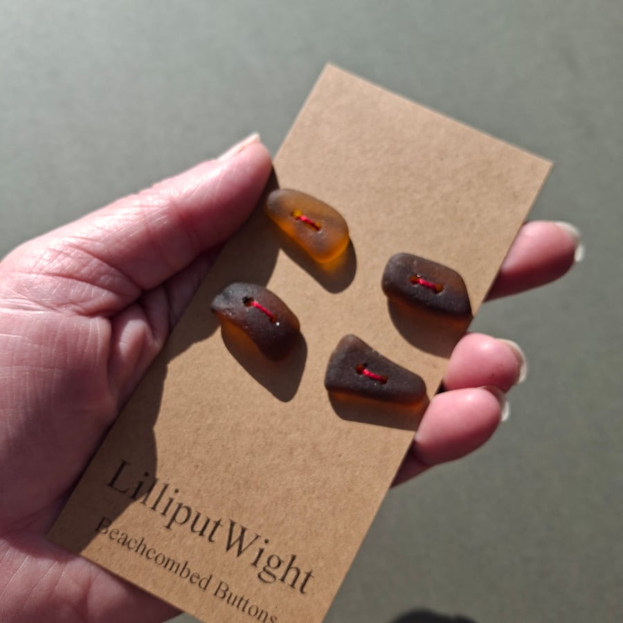 Set of four brown sea glass buttons
