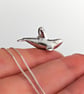 Solid Sterling Silver tiny realistic orca pendant.