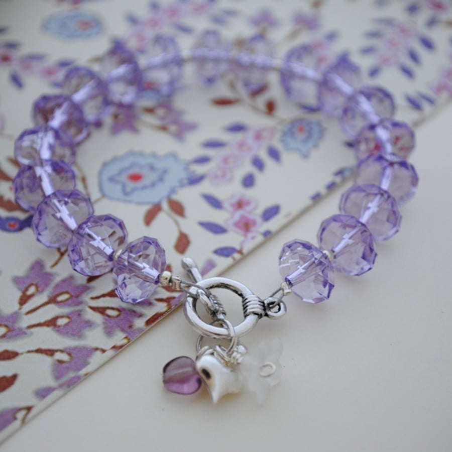 Rondelle bracelet with heart & flower charm... - Folksy