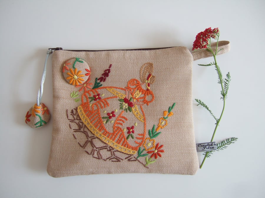 Homespun vintage embroidered crinoline lady zip up purse.