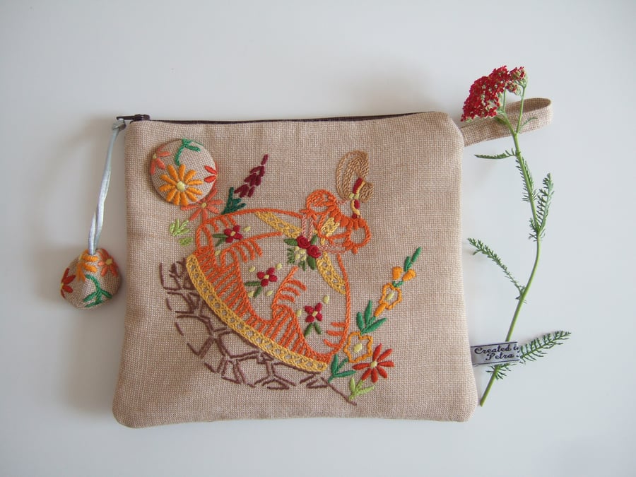 Homespun vintage embroidered crinoline lady zip up purse.