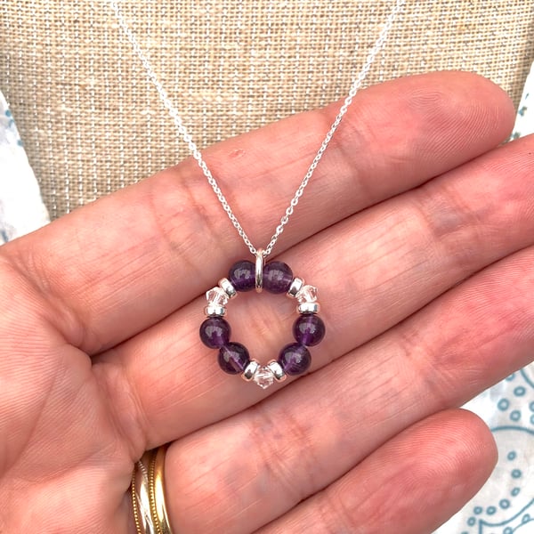 Amethyst and Swarovski Crystal Circle of life pendant. Sterling Silver 