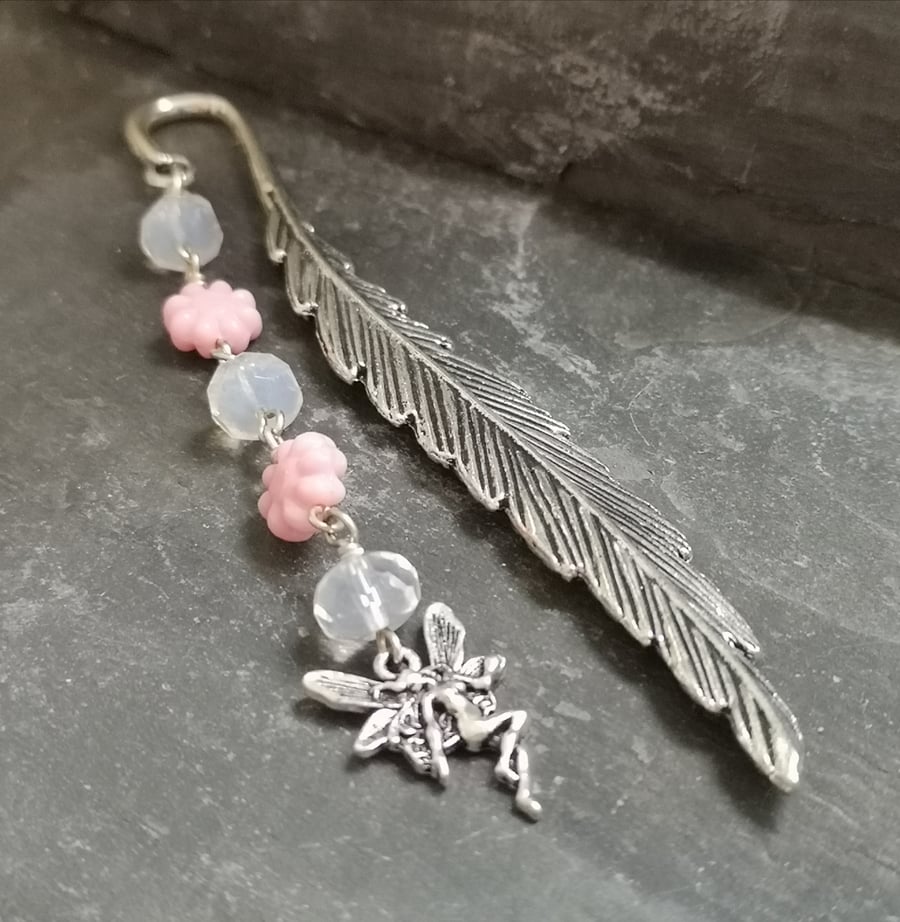Feather bookmark with pink flowers and fairy charm