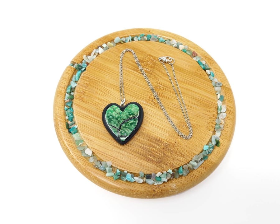 Bright green glitter heart shaped pendant on hypoallergenic chain