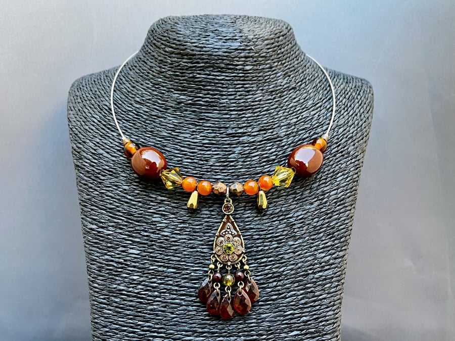 Unique upcycled bead necklace with dangly orange pendant - sustainable jewellery