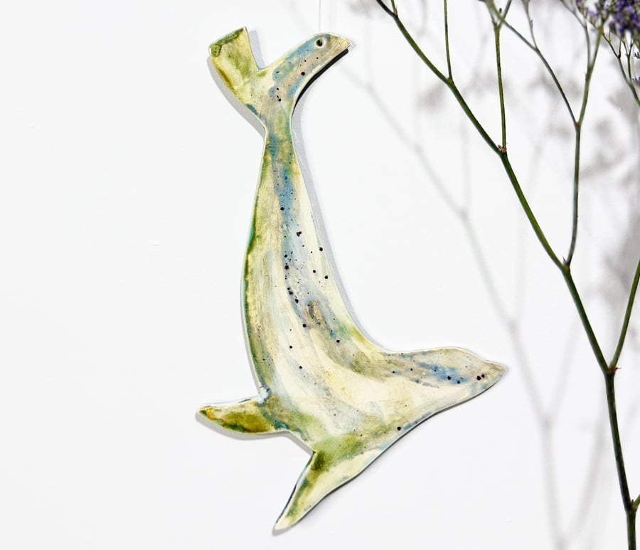 Hanging ceramic seal decoration glazed by hand and made in Norfolk