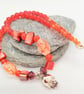 Silver Skull Pendant on an Orange Red Purple & Pink Shell Beaded Necklace - Image 9
