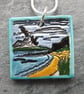 Handmade Ceramic Coastal scene pendant in turquoise - Image 1