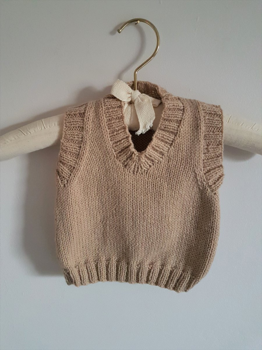 Hand Knitted sleeveless baby jumper 18" chest