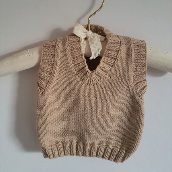 Hand Knitted sleeveless baby jumper 18" chest