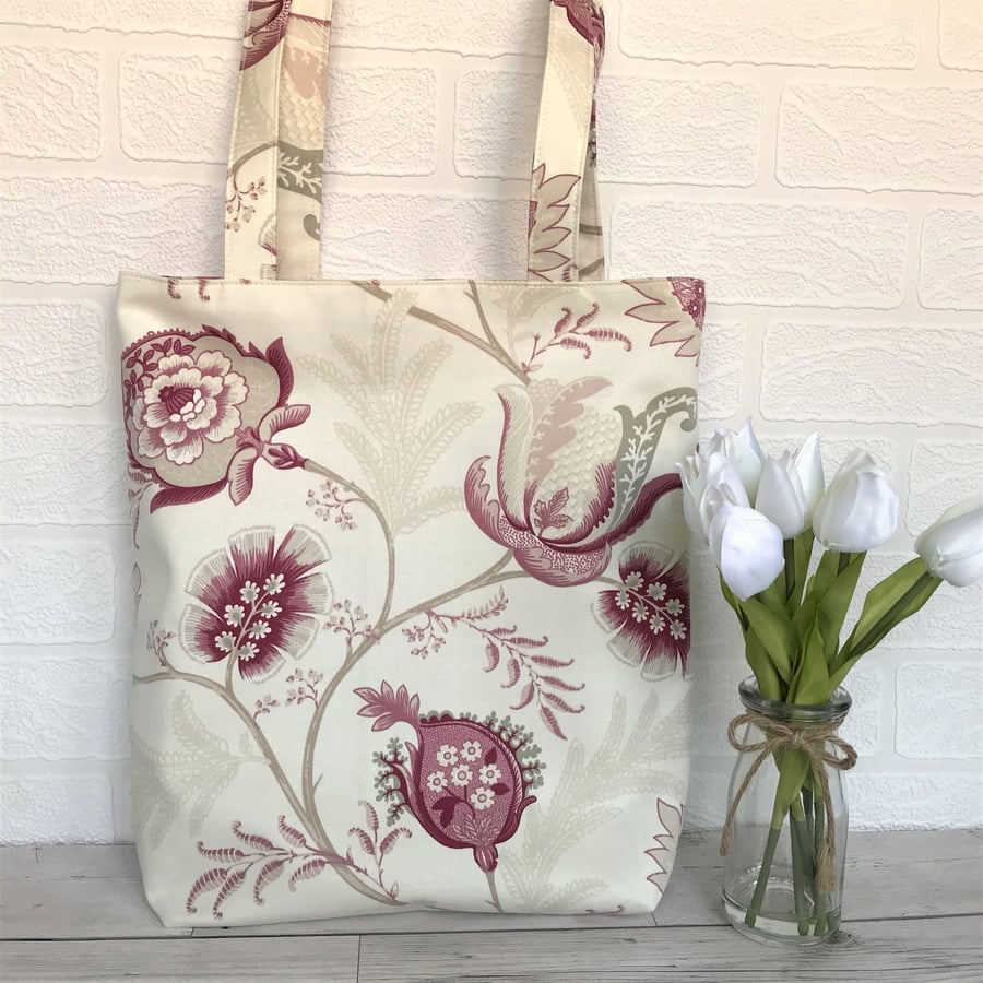 Pink patterned tote bag with large floral and paisley pattern