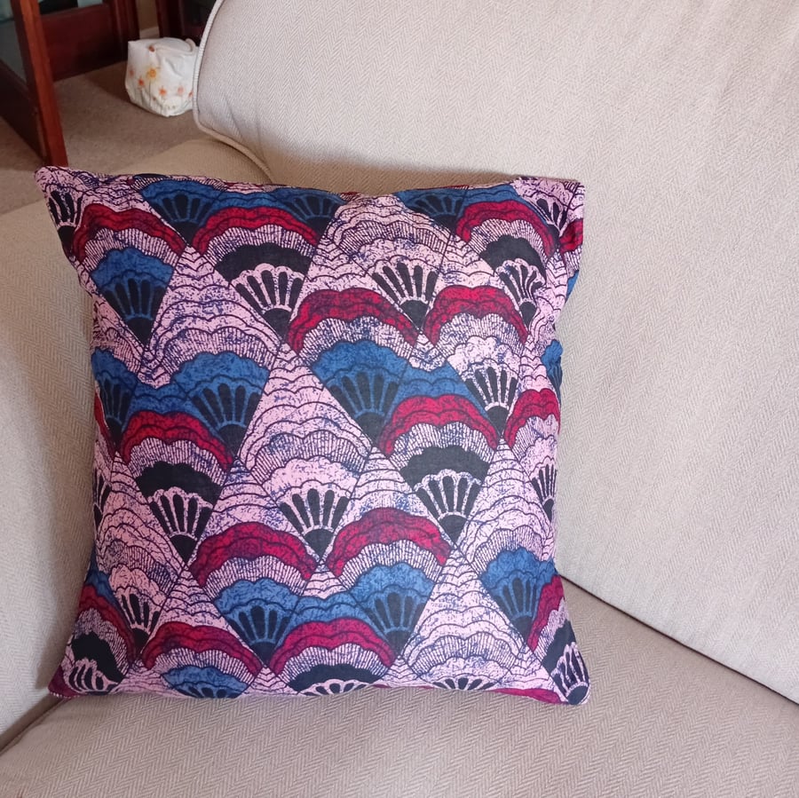 Cushion cover in pink, blue and black cotton. Choice of plain or frilled.