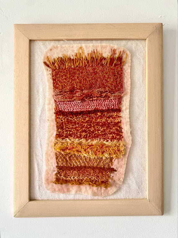 A slice of life, abstract textured embroidered art