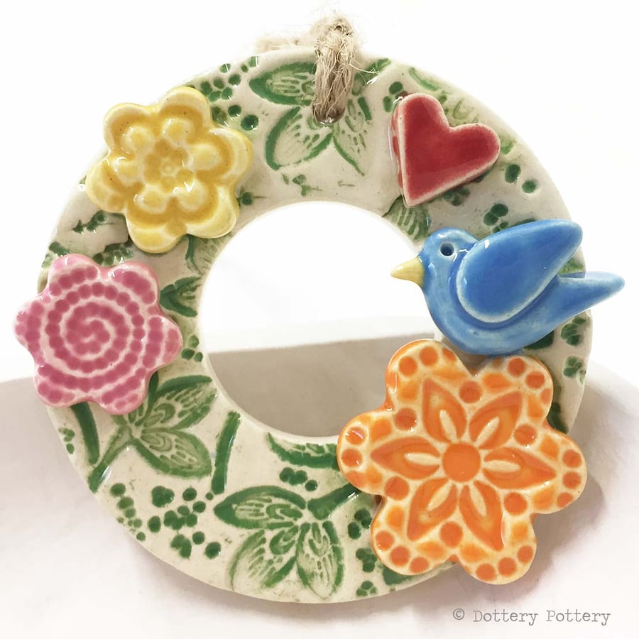 Small ceramic floral wreath decoration with bird and flowers pottery bird Create