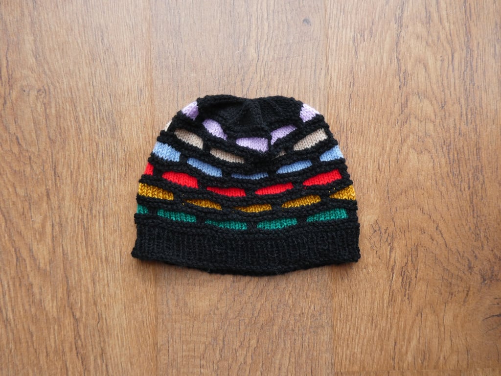 Knitted handmade black and multicoloured hat - unisex