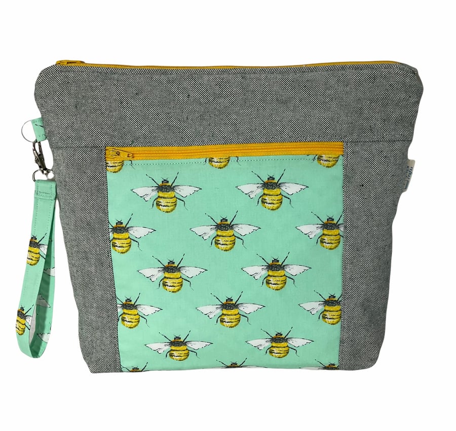 knitting zipped pouch bag with zip pocket and bees, medium wrist strap project b