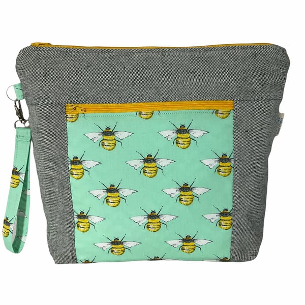 knitting zipped pouch bag with zip pocket and bees, medium wrist strap project b