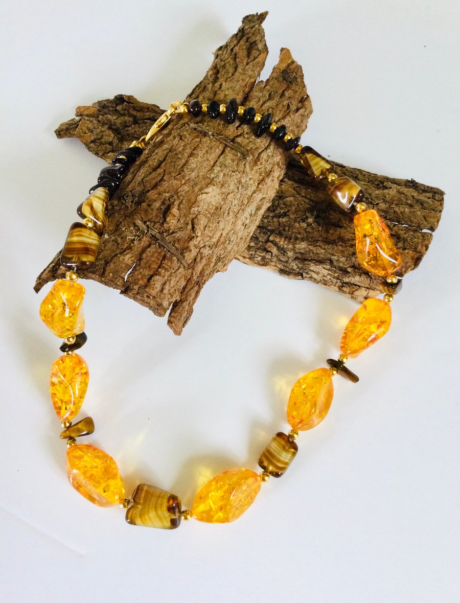 Golden amber and polished tiger’s eye beaded necklace
