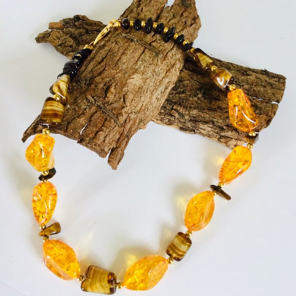 Golden amber and polished tiger’s eye beaded necklace
