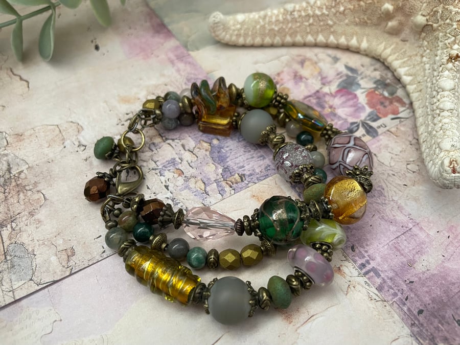 Bracelet triple stranded lampwork glass beaded bracelet , 