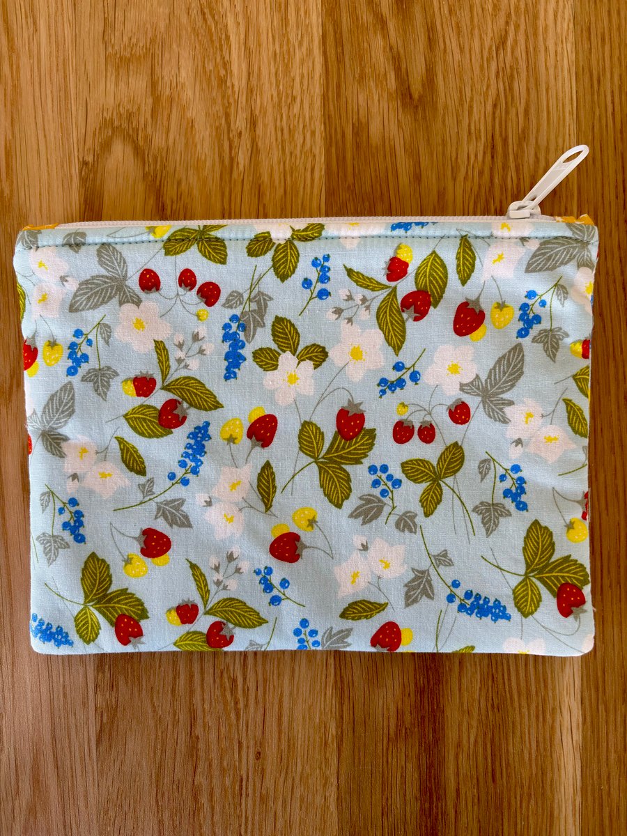 Zipped fabric pouch, purse, make up bag, in blue cotton with a strawberry design