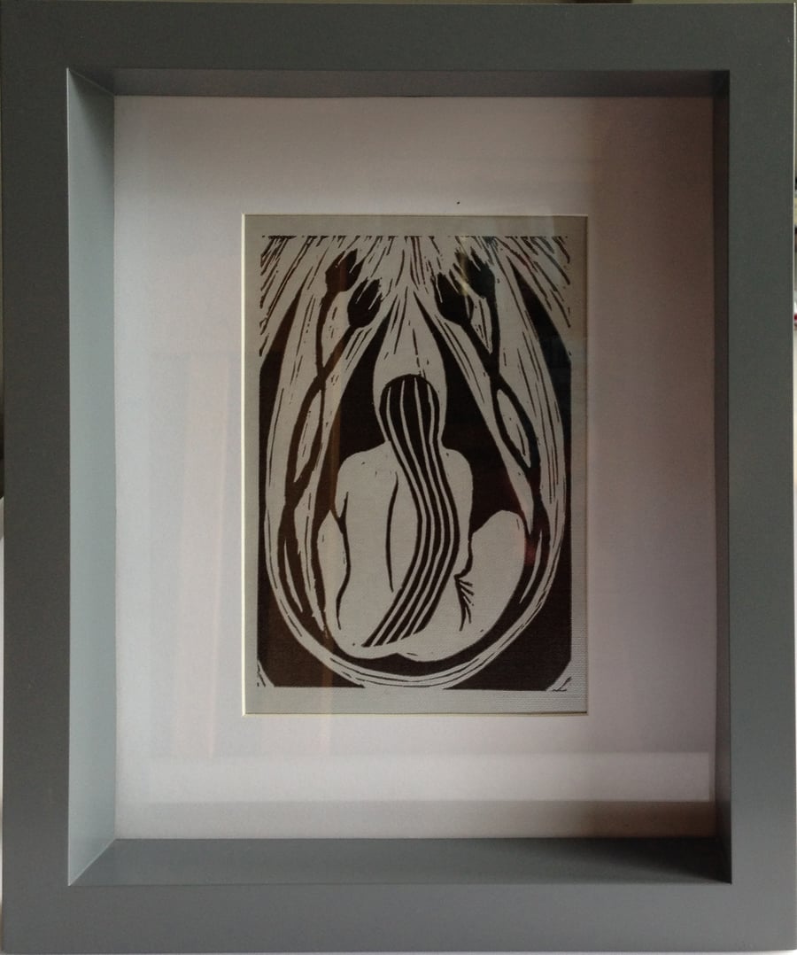 Nude in the Flowers lino print, framed