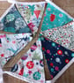 Brightly coloured modern Christmas bunting 