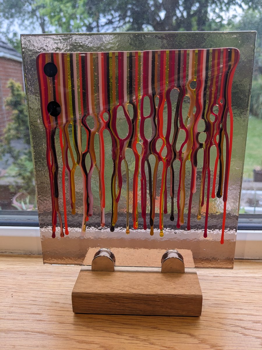 Paint drip panel Fused glass on wooden stand 