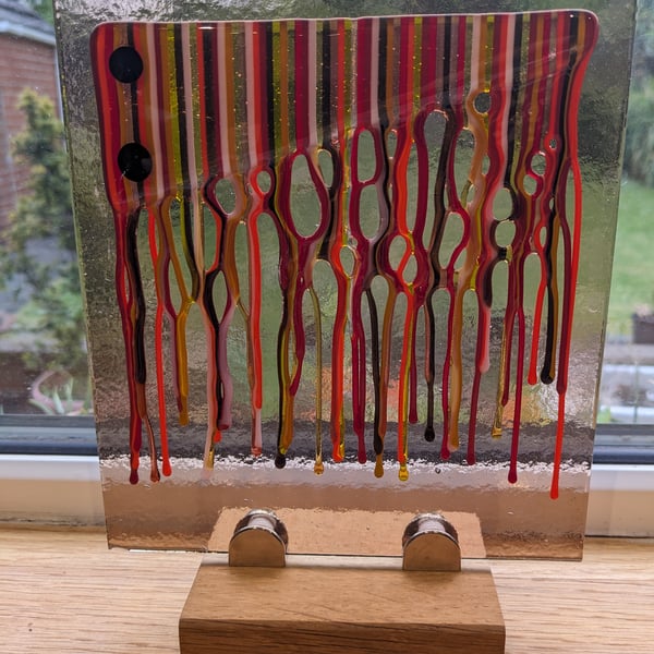 Paint drip panel Fused glass on wooden stand 