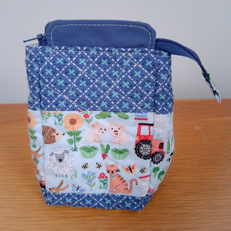 Handmade quilted cotton zipped carton: farmyard print