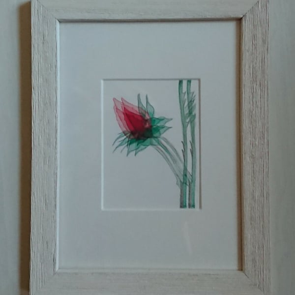 Single Red Rosebud art in small white frame, ready to hang