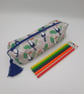 Toucan theme boxed pencil case with blue tassel. 