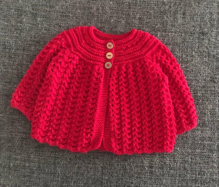 Red traditional style baby cardigan