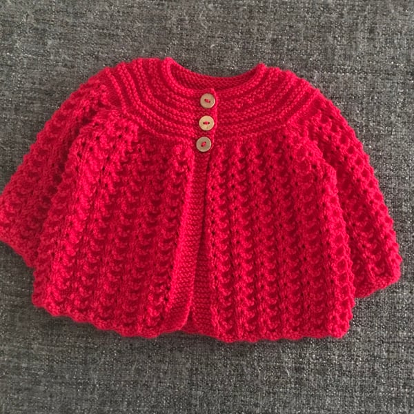 Red traditional style baby cardigan