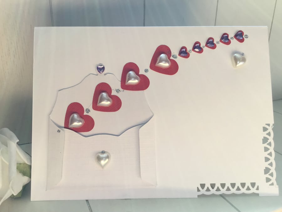 Lots of exploding hearts from a handmade envelope.