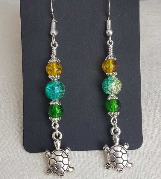 Gorgeous Dangly Tortoise Charm Earrings with Yellow Green Beads.