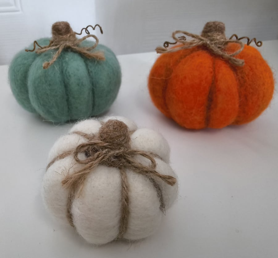 Handmade needle-felted pumpkin trio