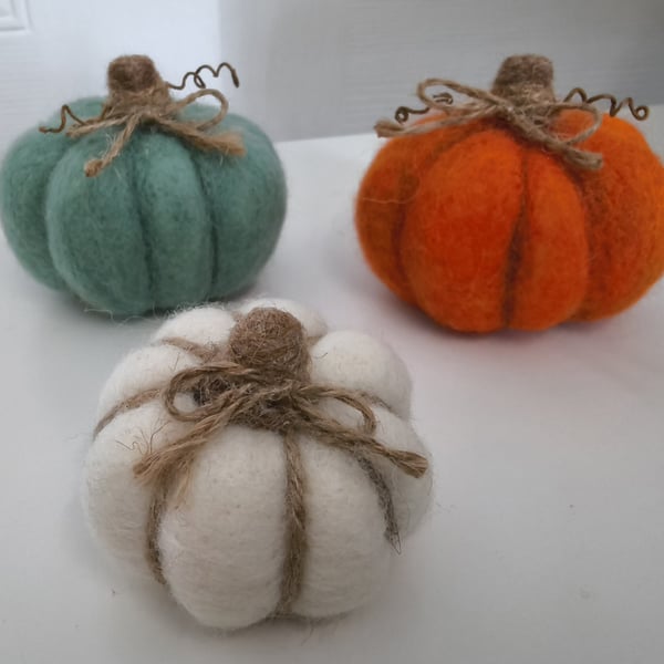Handmade needle-felted pumpkin trio