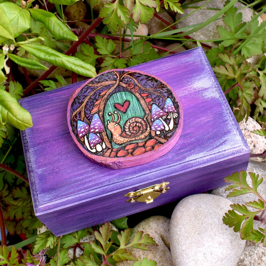 Snail at the Secret Garden gate. Wood slice trinket chest.