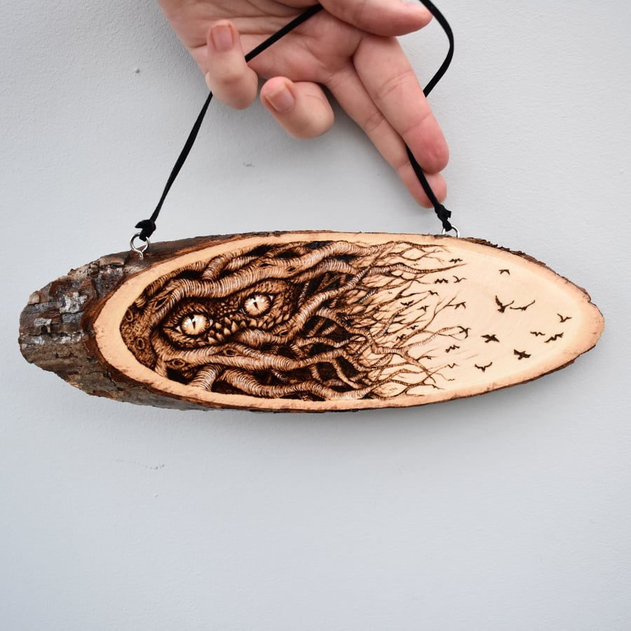 Dark and light. Pyrography hanging plaque. Eyes, forest and birds design. 