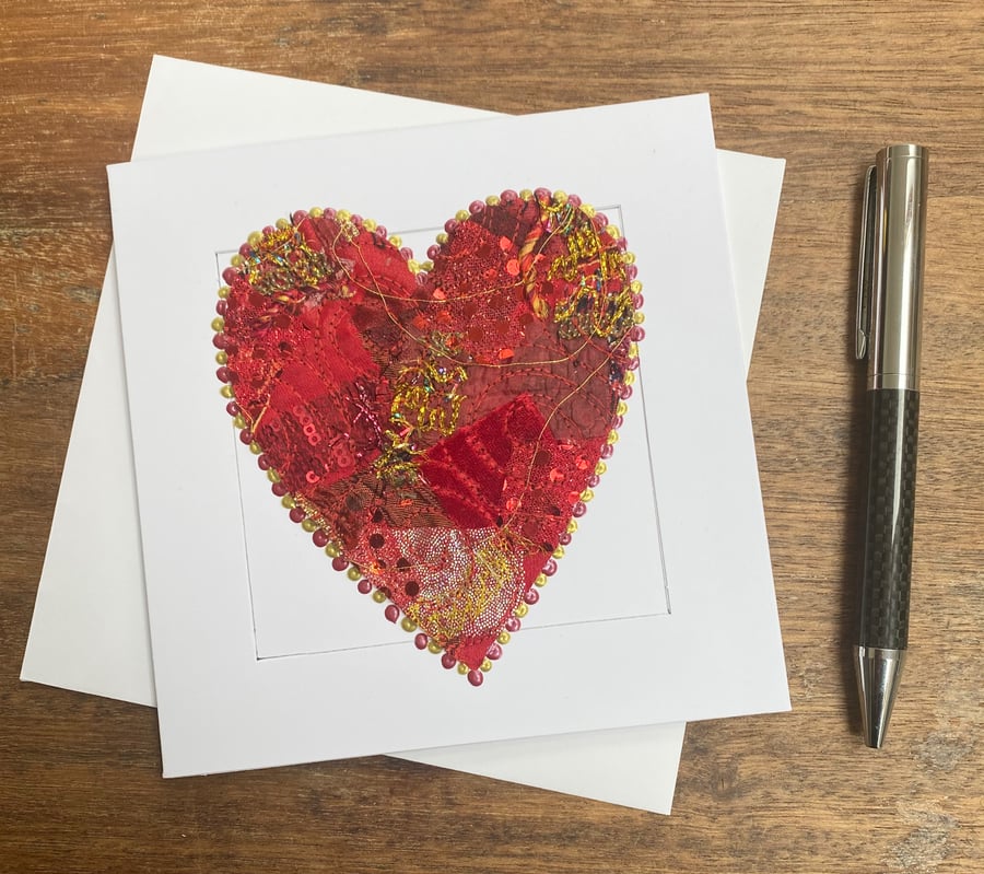 Up-cycled red and gold embroidered heart card. 